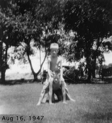 <terry and larry boykin front yard boykin farm north of portales nm Aug 16 1947> 