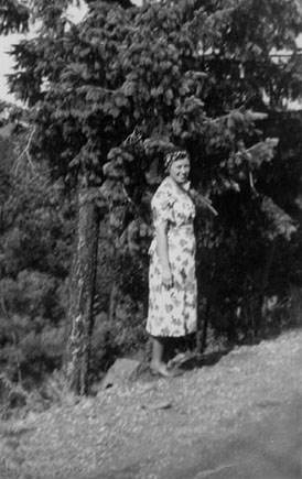 <johnie turner posed amoung pine trees possible location ruidoso>