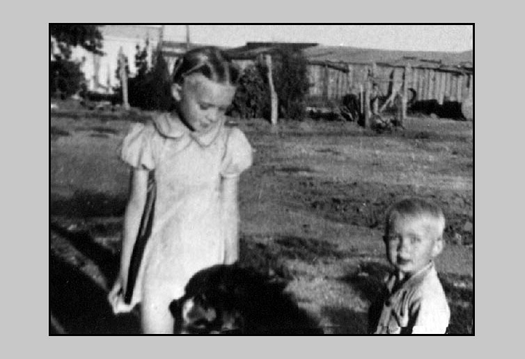 <adrienne tip and terry grandma turner's house and the barn shown in the background>