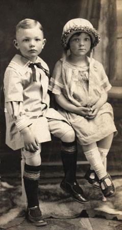 <two cute kids studio portrait restored by terry>